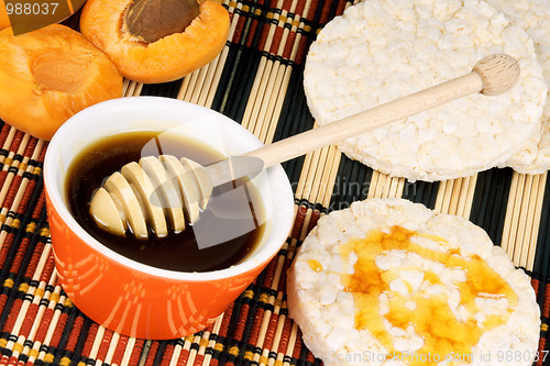 Image of Honey, apricots and rice cakes