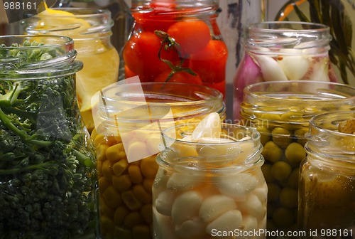 Image of Jars with various preserved food