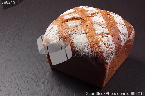 Image of Wholemeal bread on dark board