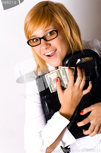 Image of businesswoman with portfolio and money