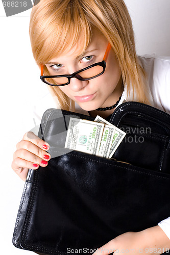 Image of businesswoman with portfolio and money