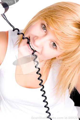 Image of blond woman with retro telephone