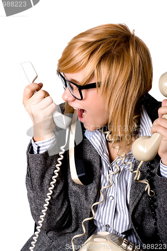 Image of businesswoman with three phones