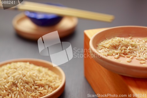 Image of Brown rice on clay plates