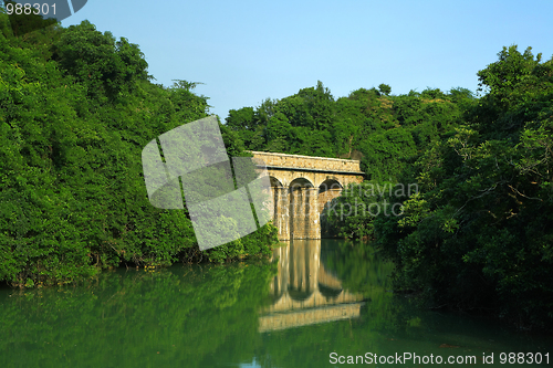 Image of lake with stone bridge