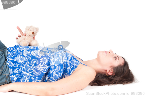 Image of Portrait of pretty pregnant woman with toy