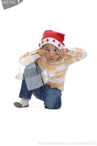 Image of boy with santa claus hat