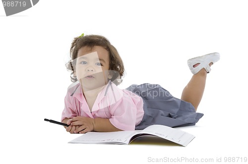 Image of cute girl with notebook and pen