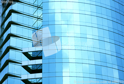 Image of modern blue glass wall of skyscraper