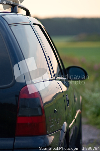 Image of A car at sunset