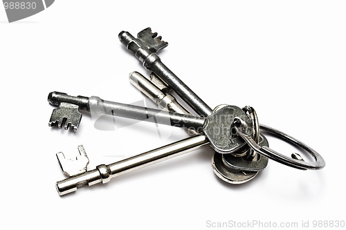 Image of A bunch of old keys isolated on white 