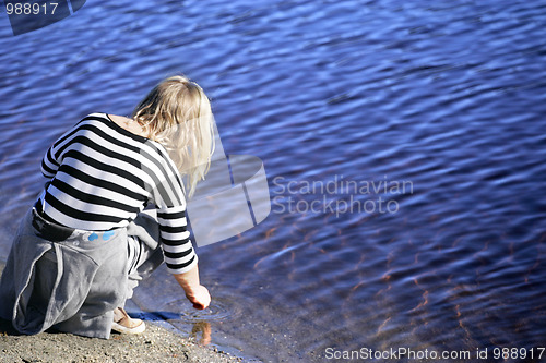 Image of Girl by water