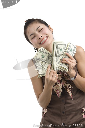 Image of pretty woman happy with lots of money