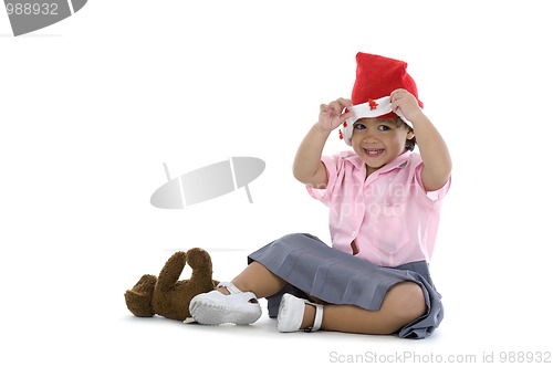 Image of cute girl with santa hat