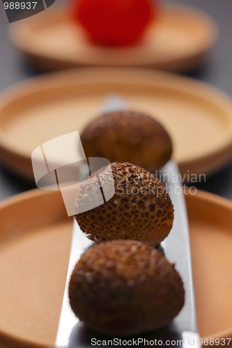 Image of Still life with mushrooms in a row