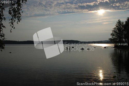 Image of Waiting for a sunset at beutiful lake Kuuhankavesi in Central Fi