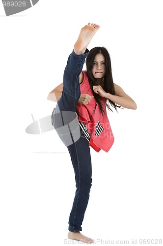 Image of woman kicking