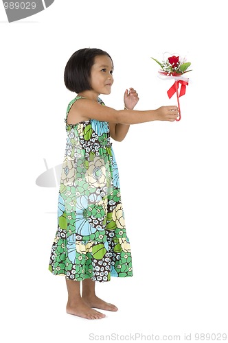 Image of cute girl with flower gift
