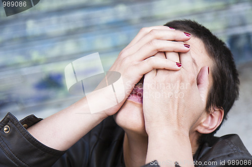 Image of anguished young woman