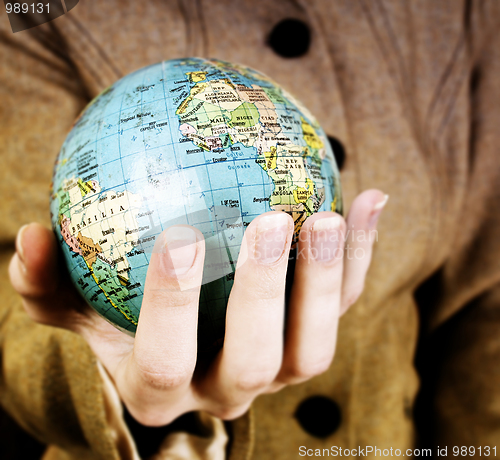 Image of Globe in a girl's hands