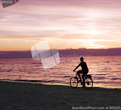Image of Bicyclist on the beach