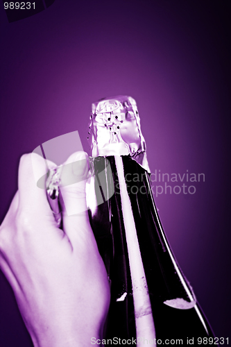 Image of Opening champagne bottle