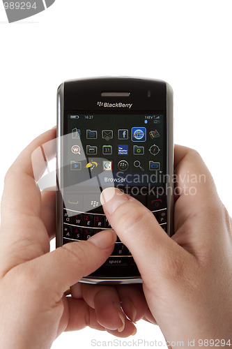 Image of Blackberry smartphone user hands