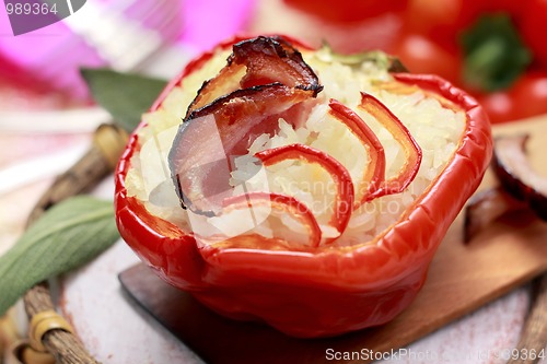 Image of Red pepper with bacon and rice stuffing