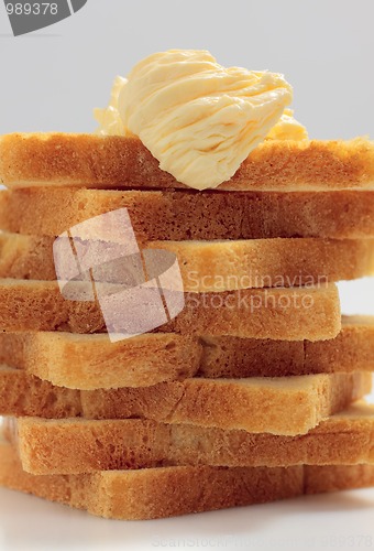 Image of Piled toast bread slices with butter