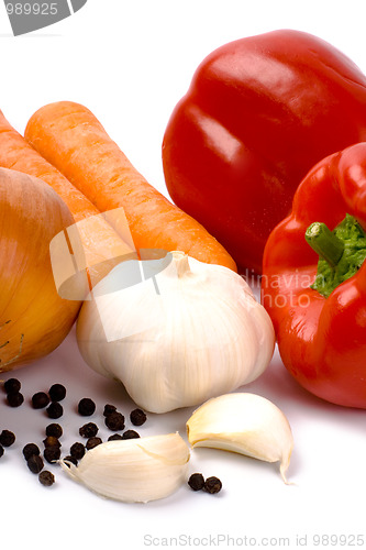 Image of paprika, onion, carrots and garlic closeup
