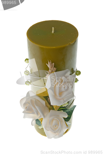 Image of Large green candle with the flower decoration