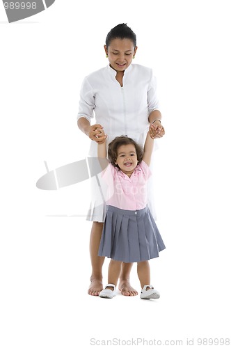 Image of  girl learning how to walk