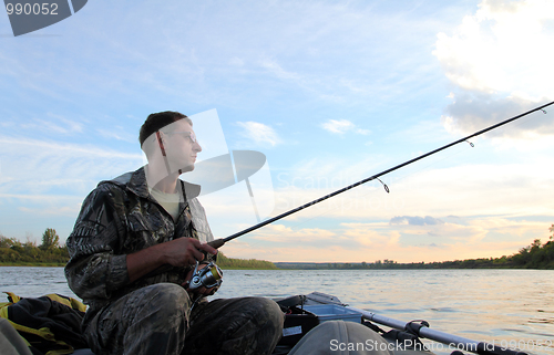 Image of men fishing with spinning