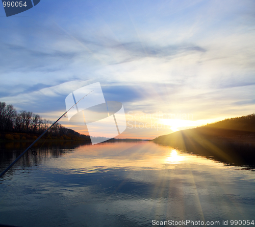 Image of fishing on evening river