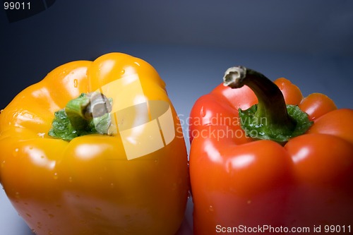 Image of Isolated Orange and Yellow Peppers