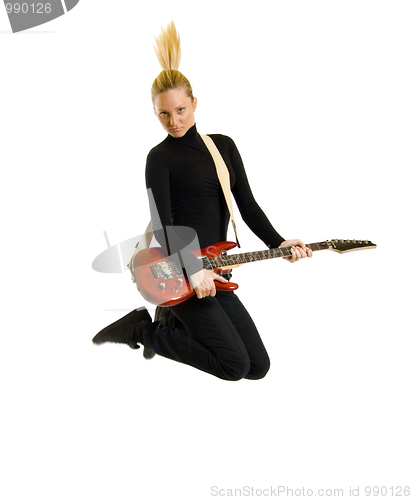 Image of woman guitarist jumps