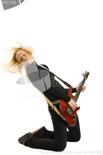 Image of blond woman playing guitar