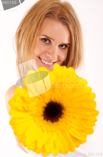 Image of woman is handing you a flower