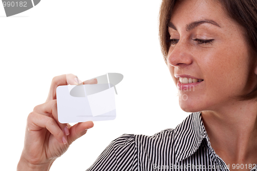 Image of woman looking at a business card