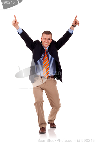 Image of business man with arms up