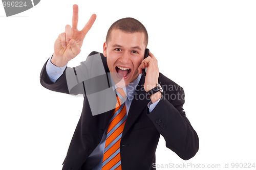 Image of  man making victory sign on phone