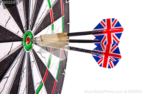 Image of darts in aim