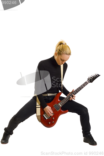 Image of girl playing electric guitar