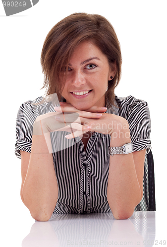 Image of business woman thinking at desk