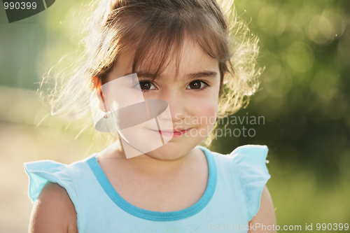Image of Little girl in blue dress