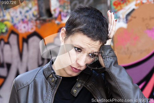 Image of  woman complaining of a headache