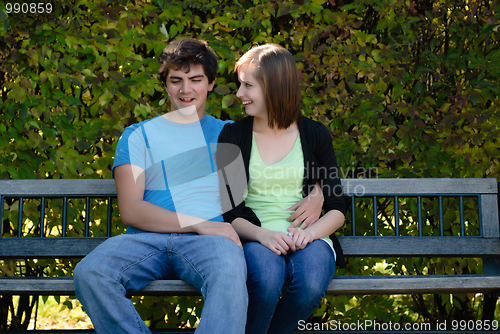 Image of Two Teenagers On A Bench