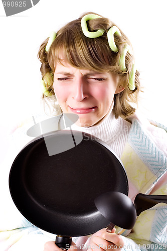 Image of crying housewife with pan
