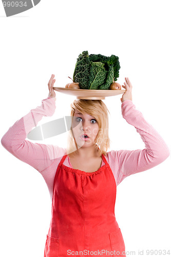 Image of woman with fresh savoy cabbage and onions