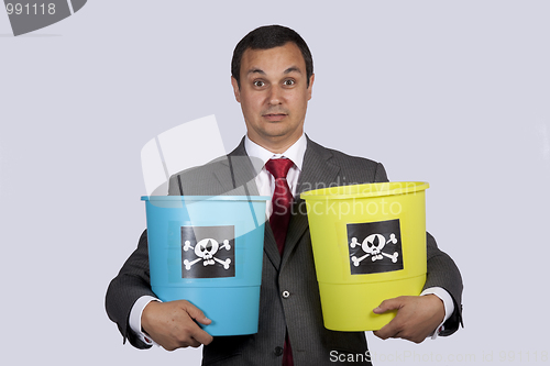 Image of Businessman holding dangerouse buckets